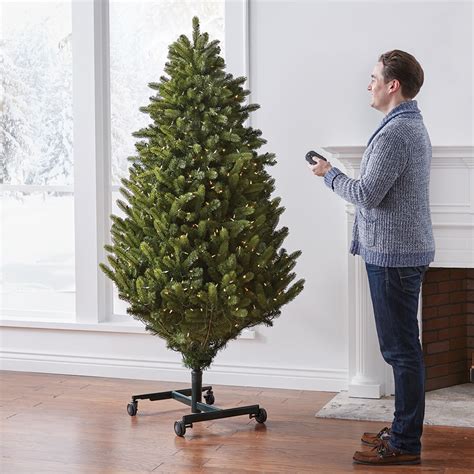 automatic electric self storage boxed christmas tree|hammers christmas tree remote control.